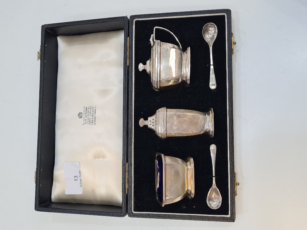 A cased cruet set by Garrad and Co. Ltd, in the matching case, Birmingham 1958, with miscellaneous s - Image 5 of 8