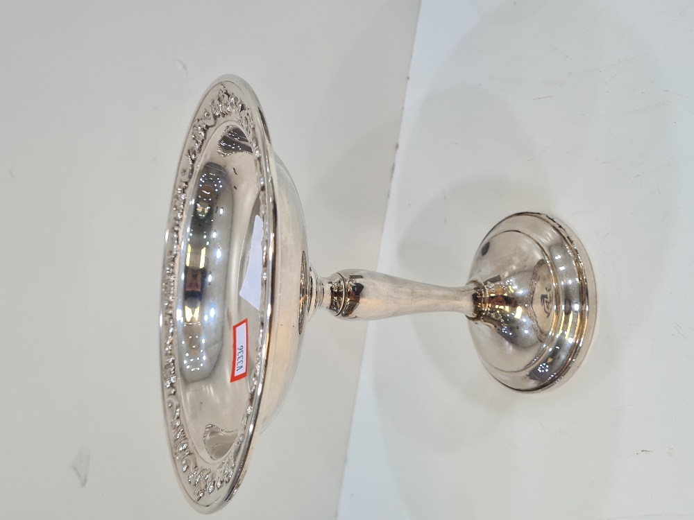 A Gorham silver bon bon dish having embossed border, on a raised pedestal circular base 17cm high, 1