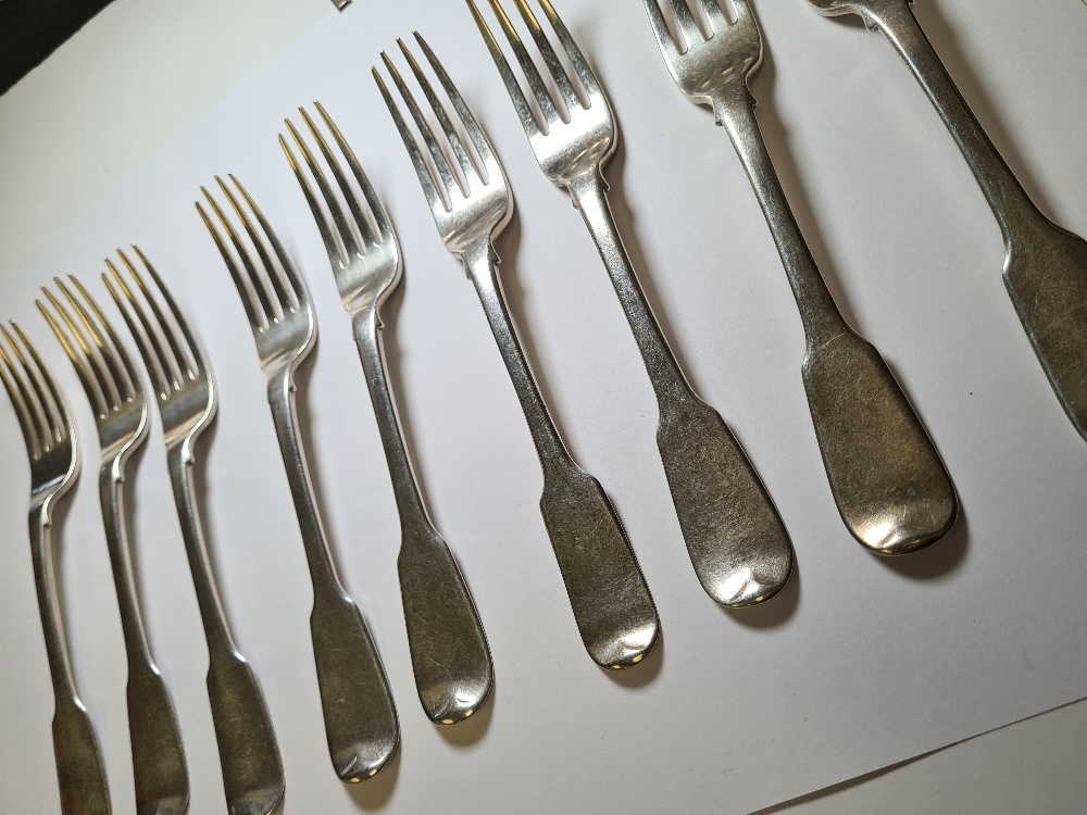 A heavy set of nine Georgian silver forks by Richard Poulden, London 1924. 21.32ozt approx. Conditio