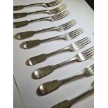 A heavy set of nine Georgian silver forks by Richard Poulden, London 1924. 21.32ozt approx. Conditio