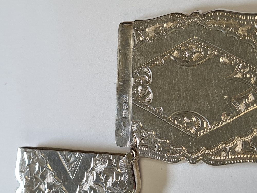 A silver card case decorative engraved body with a diamond shaped cartouche. Hallmarked Chester 1913 - Image 3 of 4