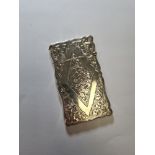 A silver card case decorative engraved body with a diamond shaped cartouche. Hallmarked Chester 1913