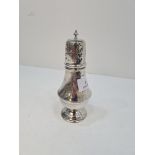 A silver sugar sifter by James Dixon and Sons, Sheffield 1946. Having engraved reeded pedestal foot