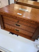 Two drawer oak cutlery cabinet, with raised lid and wing foot, fitted for 81 pieces silver flatware,