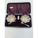 A pretty Victorian cased salt set consisting of ornate, decorative salts having fitted base interior