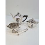 A tested silver tea service stamped Lee on the base. Possibly higher grade silver. Each piece having