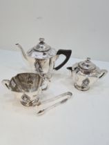 A tested silver tea service stamped Lee on the base. Possibly higher grade silver. Each piece having