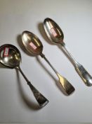 A Georgian silver dessert spoon, London 1783, with another silver spoon, Sheffield 1903, John Round