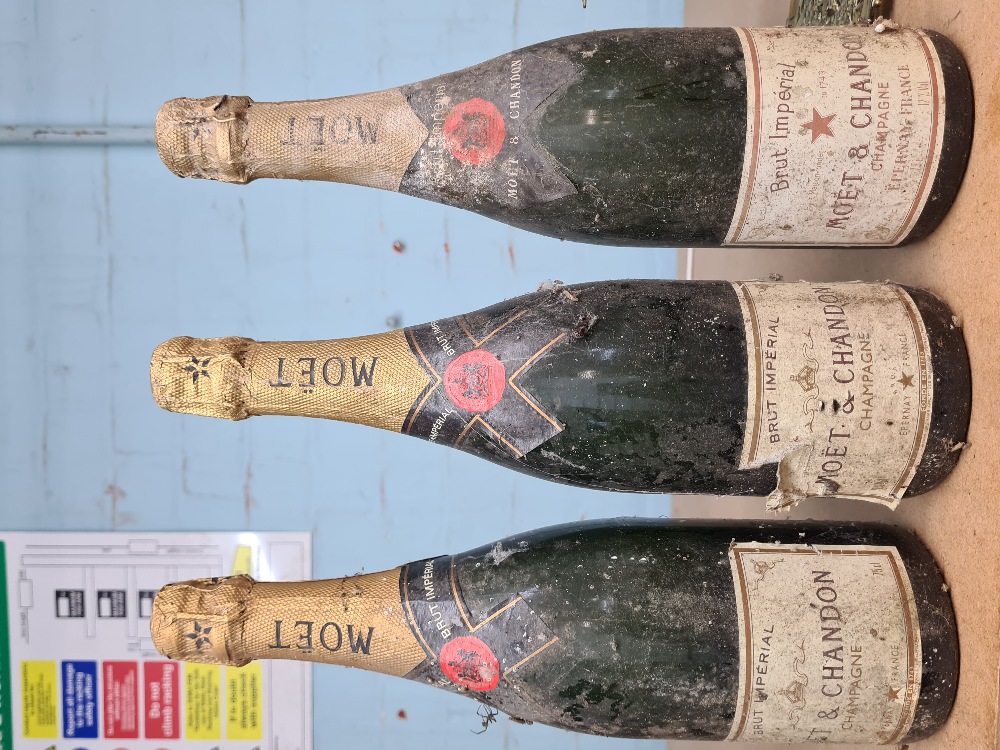 Moet and Chandon. Three bottles of vintage Champagne, all 75cl