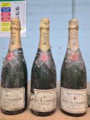 Moet and Chandon. Three bottles of vintage Champagne, all 75cl