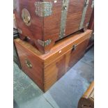 An oriental camphor wood blanket box having carved lid, 122cm
