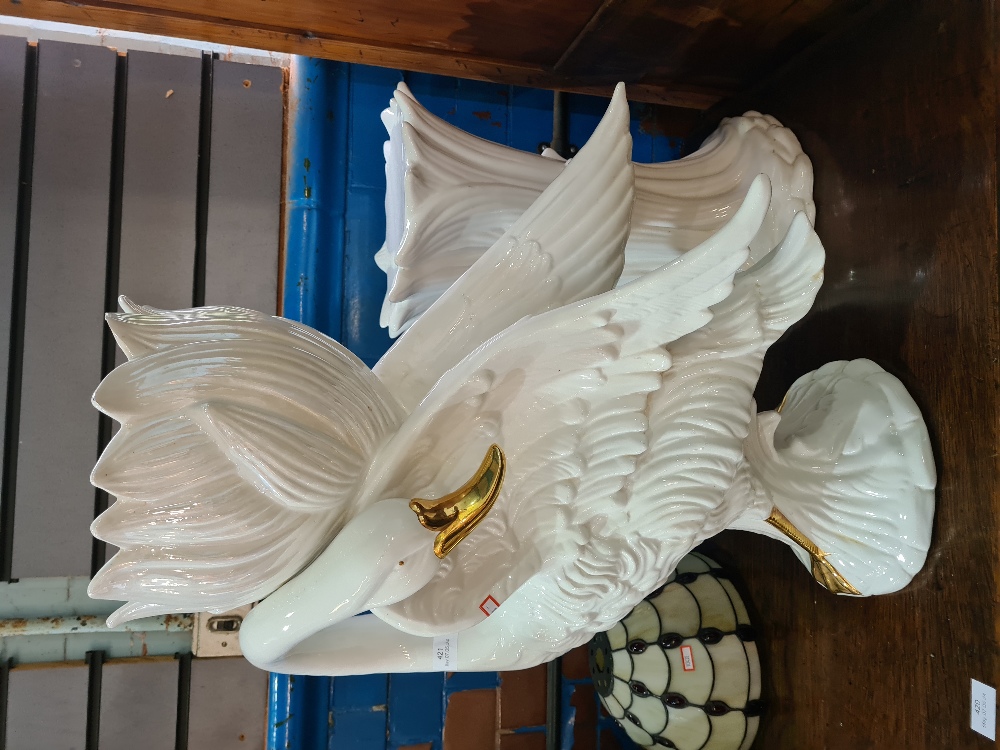 A large Bassano Italian swan jardiniere and stand