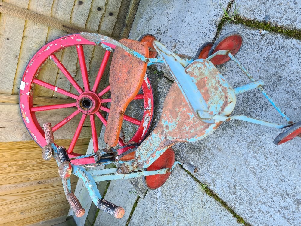 Two vintage child's tricycles, Tri-Ang in style and a small wagon wheel - Image 4 of 5