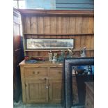 An old stripped pine kitchen dresser having 3 drawers and rack back, 184cm