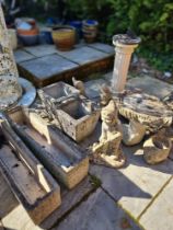 A quantity of reconstituted garden figures, pots and similar