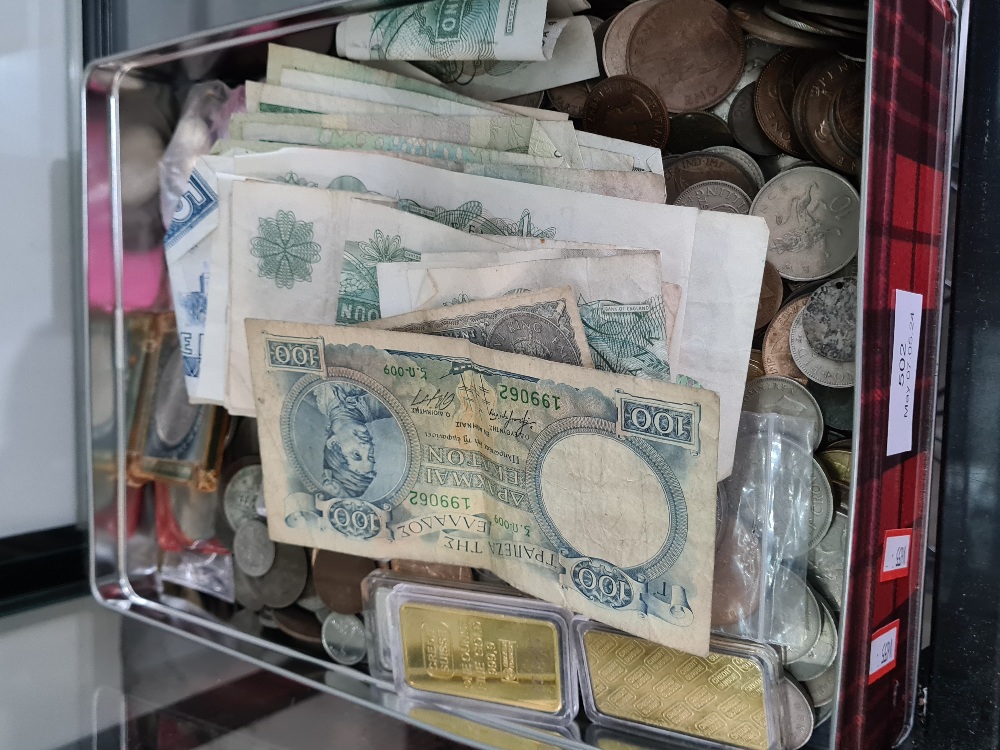 A tin of mixed coinage, bank notes, etc