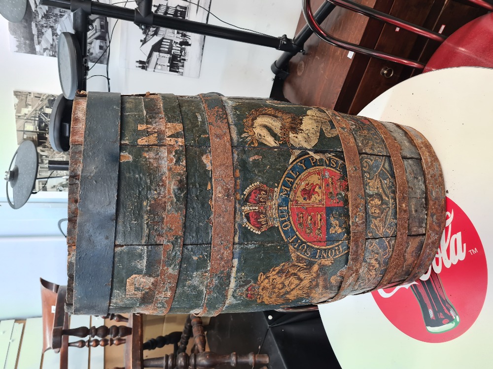 An antique Royal Navy Grog barrel, possibly 18th Century with wonderful coat of arms in original pai
