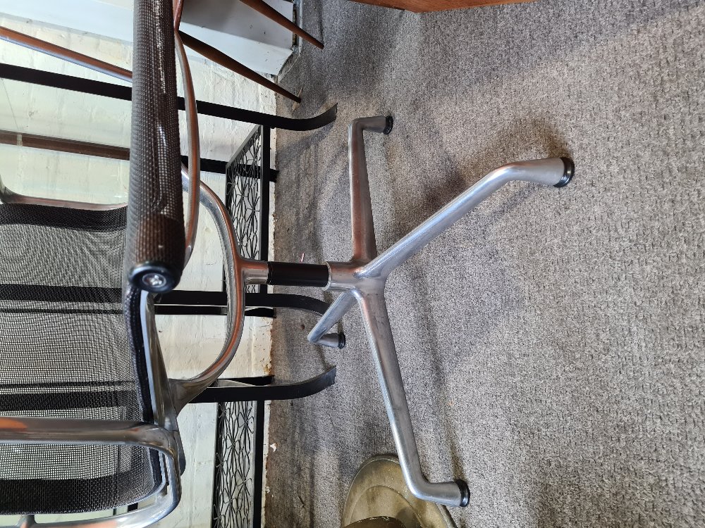 A late 20th Century Charles Eames Vitra office desk chair, aluminium supports with black mesh cover, - Image 2 of 4