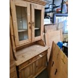 An old pine kitchen dresser having two drawers with glazed top, 100cms