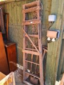 An old wooden step ladder by Woodware and 4 wooden handled garden tools