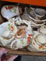 A carton of Queen's china dinnerware Virginia Strawberry pattern