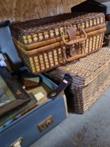A suitcase of mixed books pictures of various subjects brass folding table, picnic baskets, etc