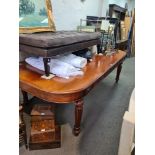 A large reproduction dining table having 6 drawers