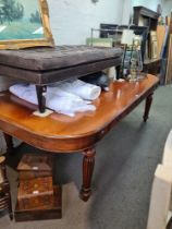 A large reproduction dining table having 6 drawers