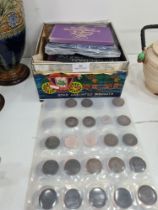 A tub of mixed coinage including 70s and 80s proof sets