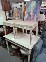 A pair of French painted chairs and a similar oblong table