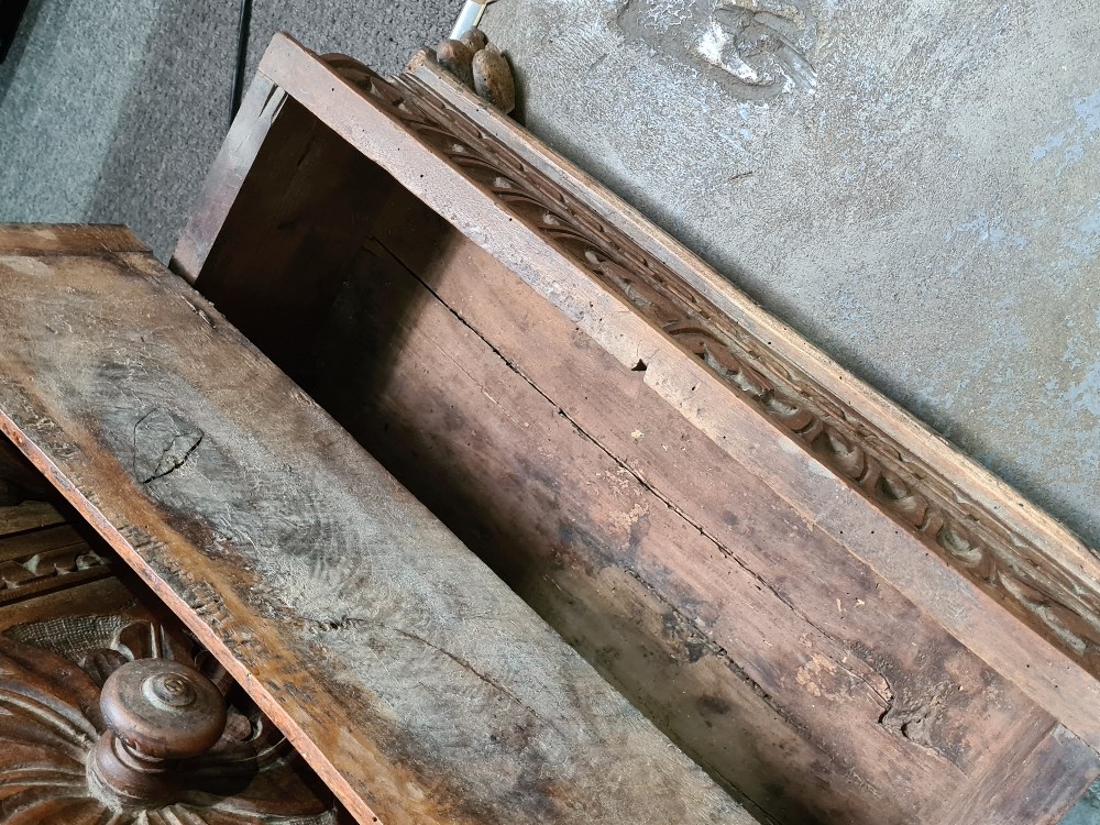 An antique carved walnut prayer kneeler/ Pri Dieu, probably Spanish, having central cupboard flanked - Image 9 of 11