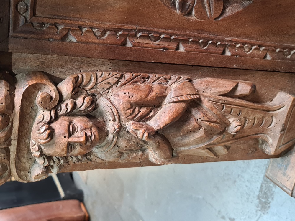An antique carved walnut prayer kneeler/ Pri Dieu, probably Spanish, having central cupboard flanked - Image 6 of 11