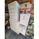 Two white painted pine chest of drawers and a pair of white painted bedside cupboards