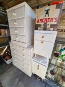 Two white painted pine chest of drawers and a pair of white painted bedside cupboards