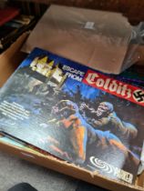 A box of pictures to include "escape from Colditz" by Parker