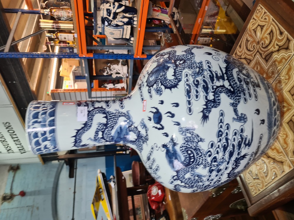 A large 20th Century Chinese blue and white vase decorated dragons, 60cm approx - Image 2 of 3