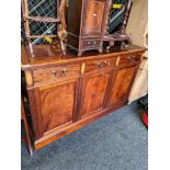 A reproduction inlaid sideboard having three drawers