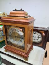 A reproduction Georgian style bracket clock with German movement and a Comitti wall clock