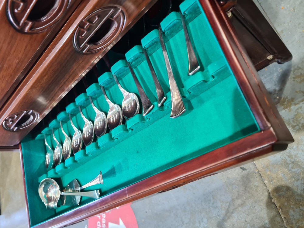 Robee & Berking an extensive silver plated canteen of cutlery in an oriental carved cabinet having f - Image 7 of 7