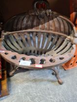 A steel oval fire basket