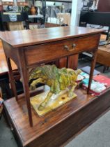 A Georgian mahogany side table having long drawer and a Pembroke table