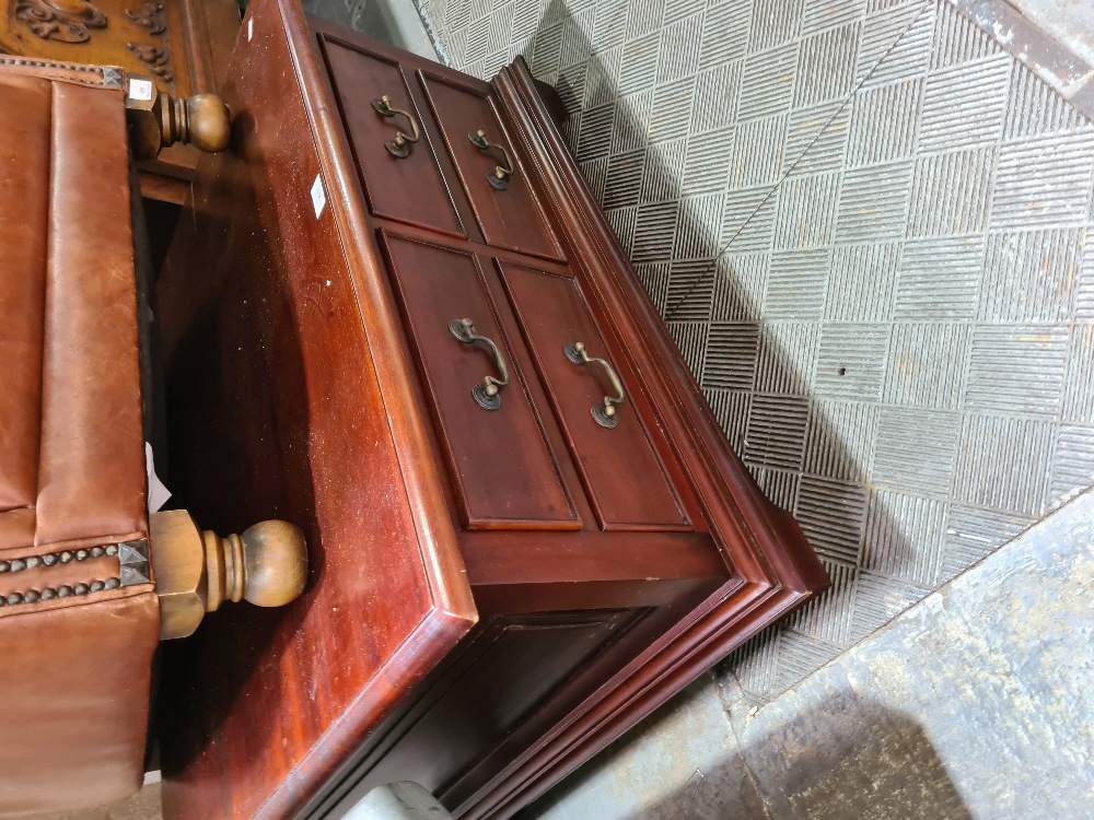 A reproduction mahogany coffee table, having 8 drawers