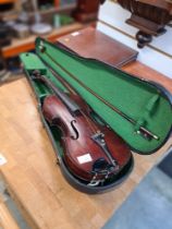An old Violin in case, size 14"