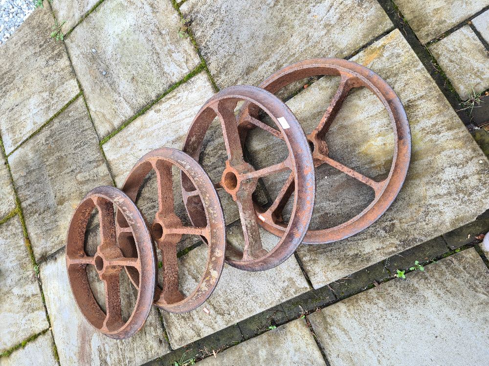 Four cast iron wheels