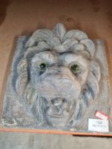 A lead style lion mask wall plaque