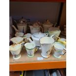 A quantity of 1930s Art Deco coffee pots, cream jugs and similar