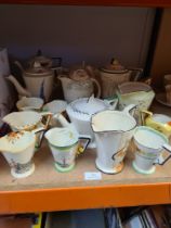 A quantity of 1930s Art Deco coffee pots, cream jugs and similar