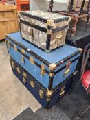 Three modern travelling trunks with metal and studded decoration