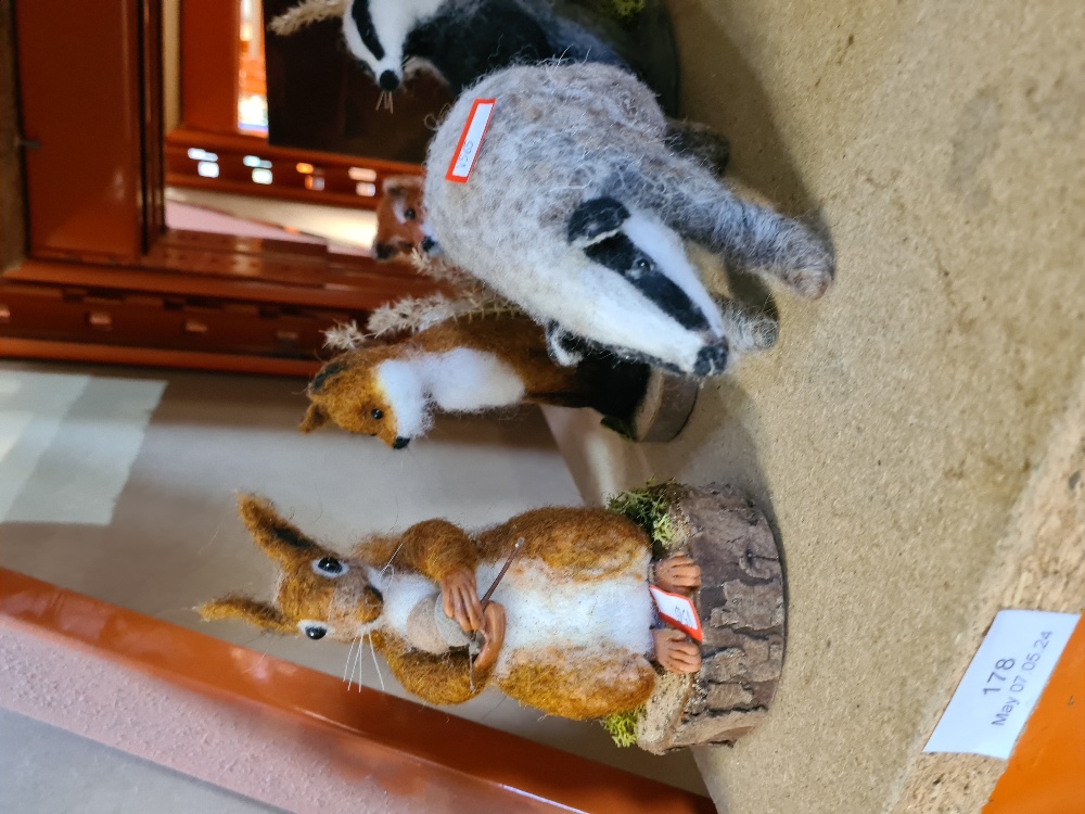 Five various felt animals including foxes, badgers and a squirrel
