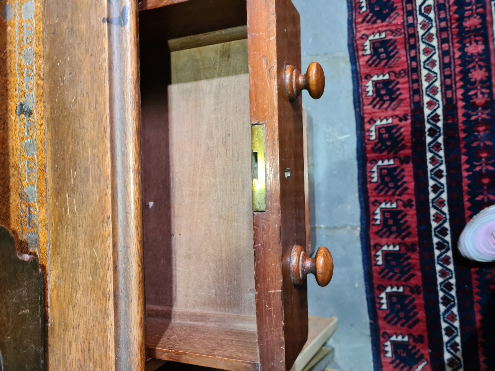 A late Victorian oak twin pedestal desk having nine drawers, 121.5cms - Image 3 of 4